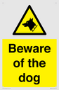 beware-of-the-dog-with-dog-warning-symbol~